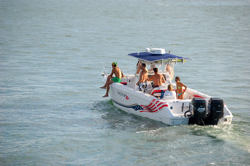 cabin cruiser party © richard pross