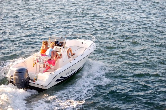 four ladies in a motorboat