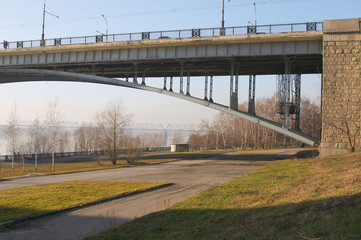 Fototapeta premium fragment of the automobile bridge through the river.