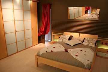 wood bedroom with white closet
