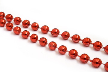 red beads on white background