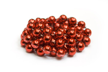 pile of red beads isolated on white