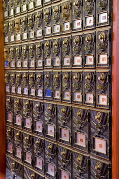 a wall of mail boxes