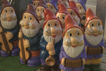 set of garden gnomes playing musical instruments