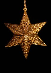 brightly lit star ornament