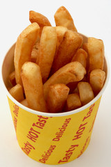 close up of fries in a chip bucket