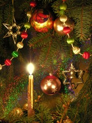 christmas tree and burning candle