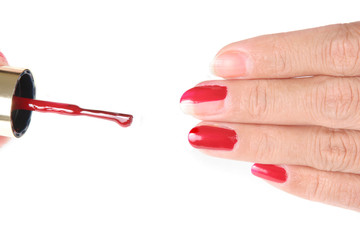 nails being painted red