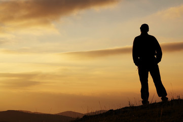 men on the sunset background