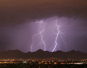 lightning over the city and mountains