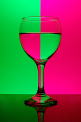 glass on neon background