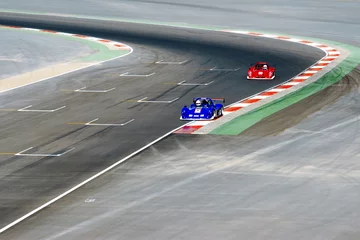 Ingelijste posters red and blue racing cars © jongd