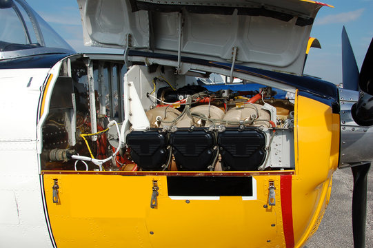 exposed engine of propeller airplane open hood