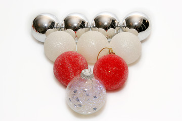 various color christmas balls forming a pyramid