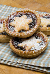 fruit mince tarts for christmas day on tea towel
