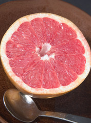 half pink grapefruit ready to serve