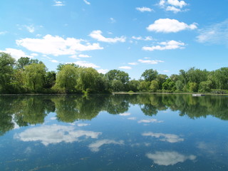 Fototapeta na wymiar blue sky mirroring in the lake