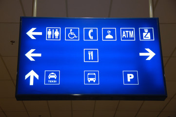 lighted sign board in airport