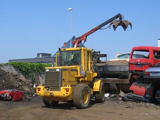 loading car into crusher