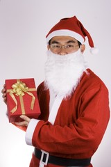 santa claus holding a present