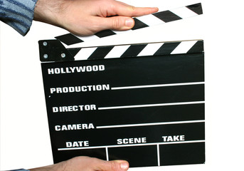 holding a clapboard