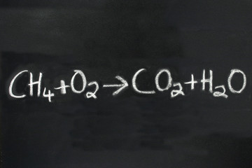 chemical equation on a blackboard