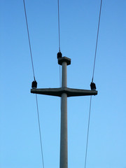 Obraz premium electric pillar over sky background 2