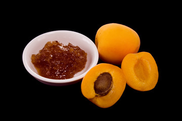 apricots and apricot jam on black