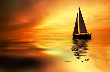 Fototapeta premium żeglarstwo i zachód słońca
