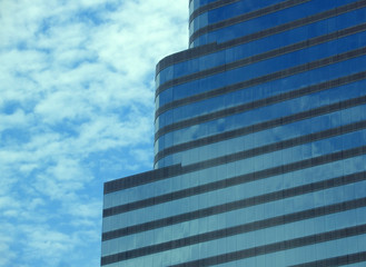 striped blue glass skyscraper