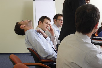 business people at boring meeting