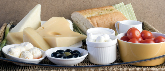 breakfast with cheese, olive, tomato and bread