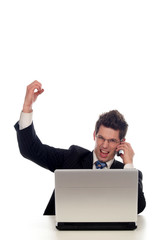 businessman using laptop, screaming