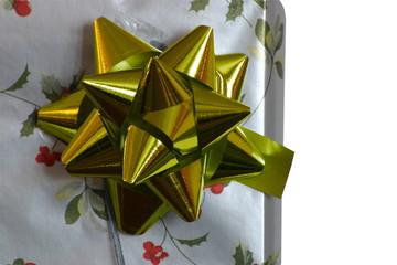 present and golden bow closeup