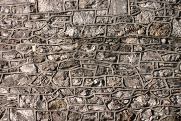 old dark stone wall.