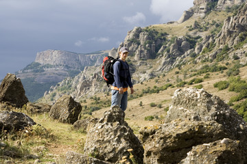 Fototapeta premium tourist at mountains