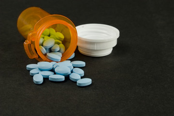 blue pills and bottle