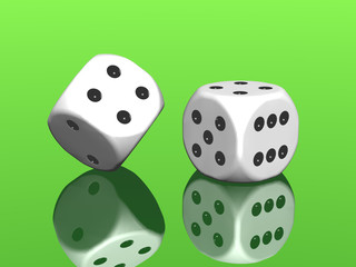 white dices on green background