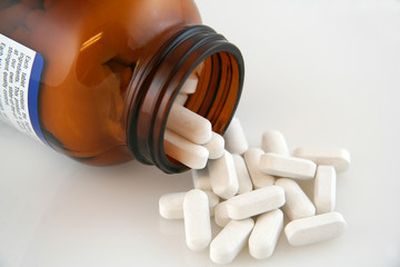 white calcium pills