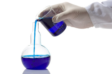 lab worker mixing chemicals