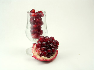 pomegranate seeds and shot glass