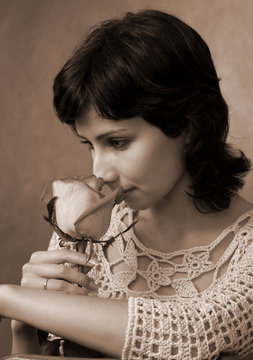 woman smeling a rose (039)