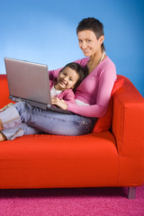 mother and douther with laptop