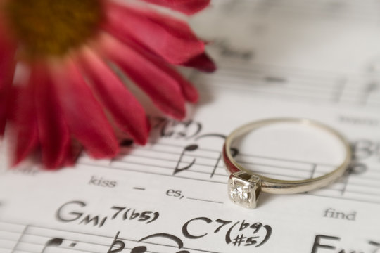 music, kisses and a diamond engagement ring.
