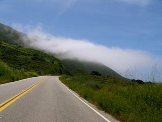 Fototapeta na wymiar coastal road with fog
