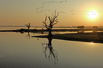 myanmar, amarapura, u bein bridge; stunning sundown from u bein