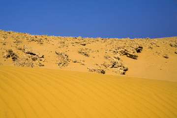 sand, rocks and blue sky