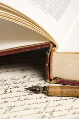 old book and pen