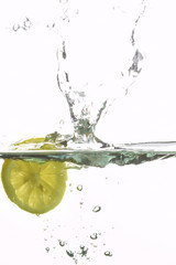 lemon splashing water