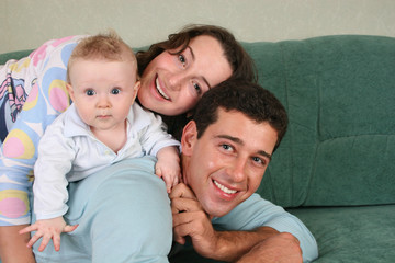 family with baby on sofa 2